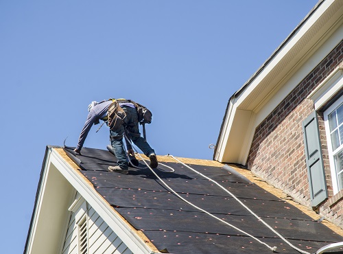 Roof Contractors in Mattoon IL replacing a roof