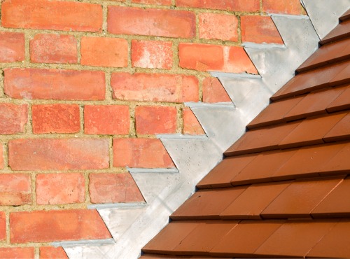 New flashing is seen on a chimney. Popejoy Roofing does Flashing Repair in Fisher IL.