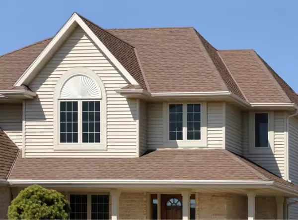A home with a new roof and siding, part of Popejoy's expert Roofing & Exterior Services for Central Illinois